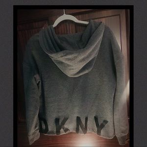 Women’s grey labeled on the back, DKNY in black.